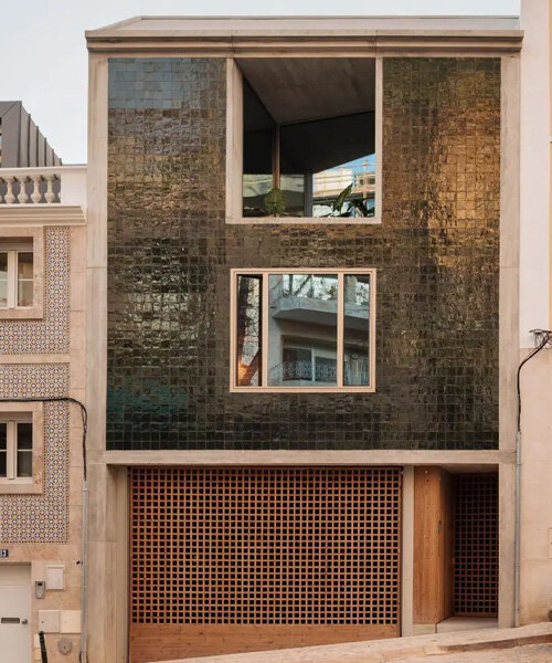 a facade of glimmering tiles fronts this bak gordon-designed home in lisbon, portugal