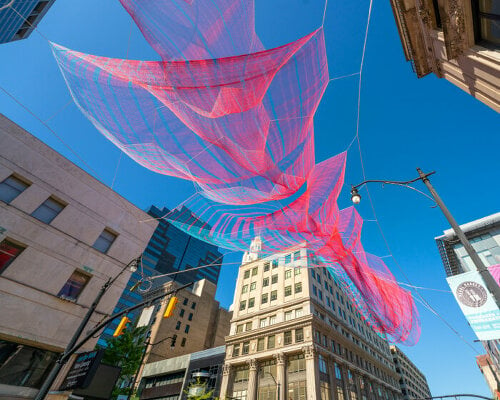 'current', the translucent fiber tapestry by janet echelman, sways and levitates over columbus