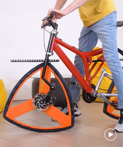 who said wheels have to be round? this triangle-wheeled bike is just as functional